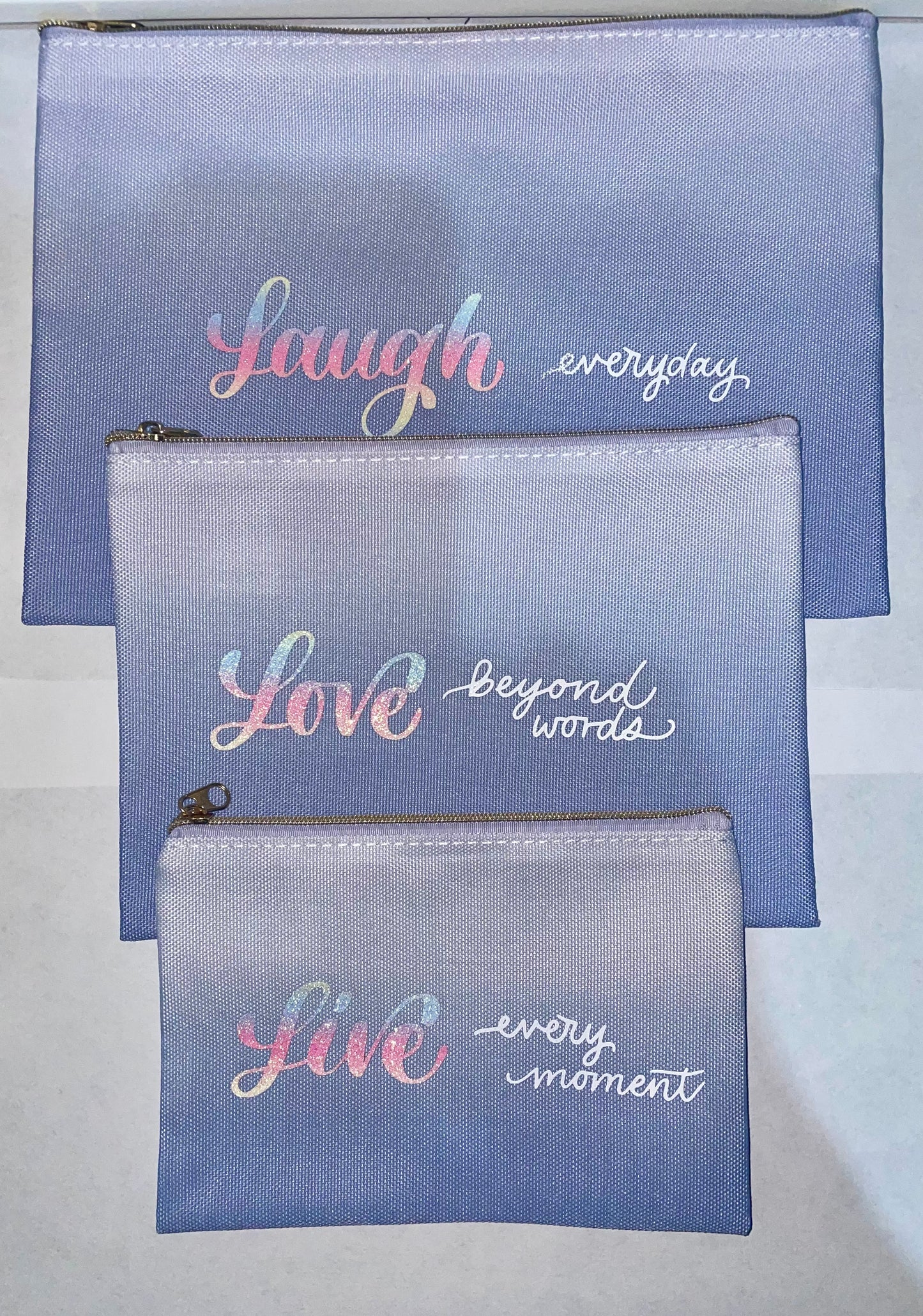 Set de 3 bolsos de maquillaje Laugh, Love and Live