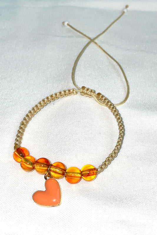 pulsera hilo y corazon anaranjado